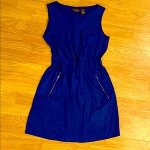 Light weight summer dress. Pockets with zippers.